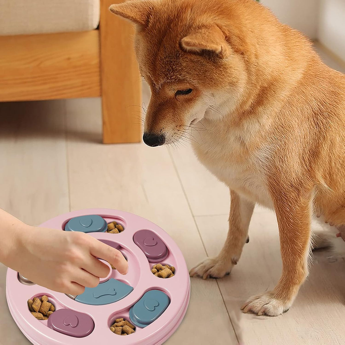 Pink dog puzzle toy treat dispensing feeder